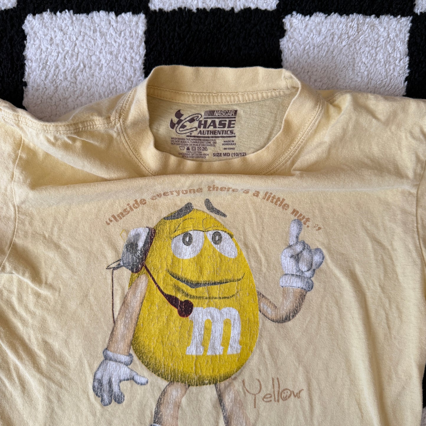 unique vintage whimsy 90s y2k NASCAR M&M graphic baby tee