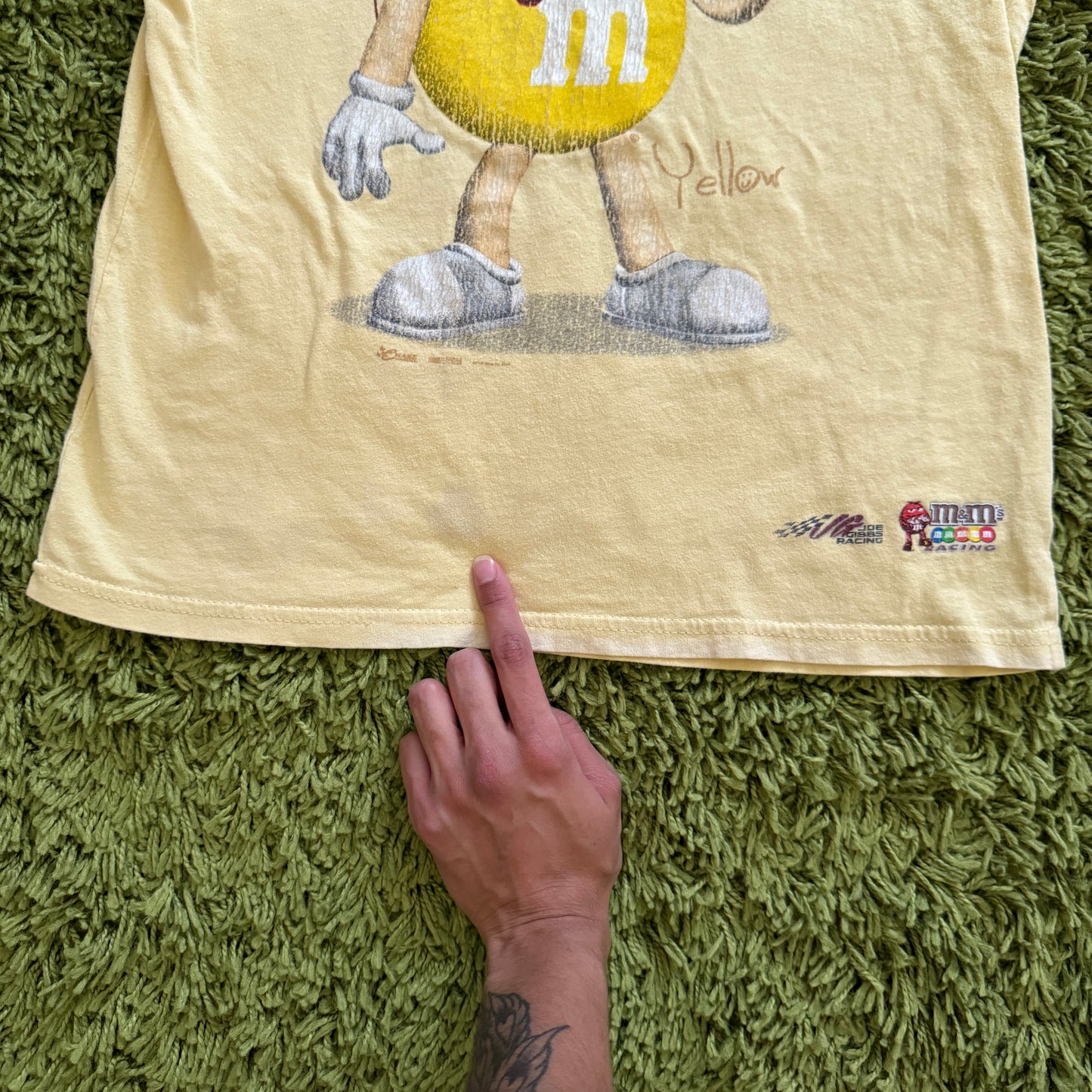 unique vintage whimsy 90s y2k NASCAR M&M graphic baby tee